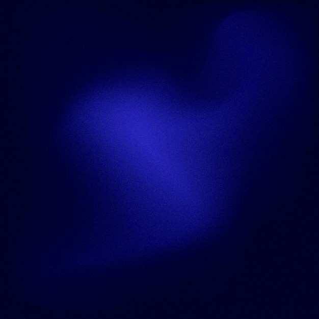 Grainy dark gradient background using blue colors