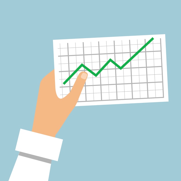 Hand holds a graph going up