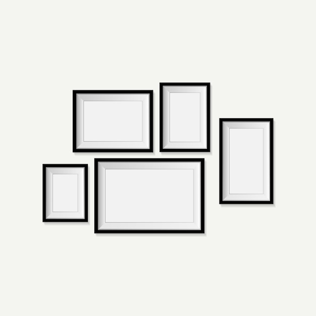 Isolated against a wall a blank picture frame template set