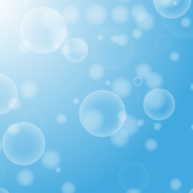 light blue abstract background with a bokeh in the form of circles.
