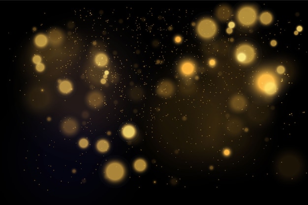 Magic golden concept. Abstract black background with bokeh effect.
