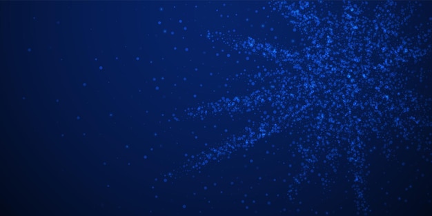 magic stars sparse christmas background. subtle flying snow flakes and stars on dark blue night background. artistic winter silver snowflake overlay template. fetching vector illustration.