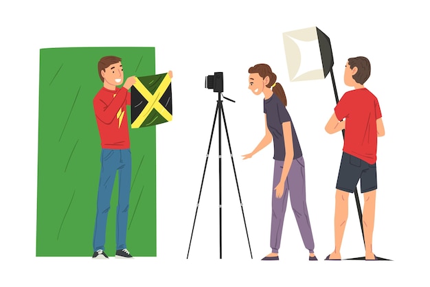 Male blogger streaming online cameraman and light technician recording video social media blogging