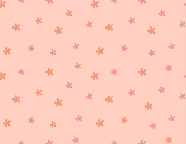 Pink wallpaper with a flower pattern on it