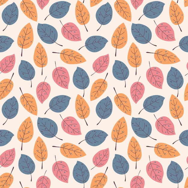 seamless autumn pattern of simple leaves on a beige background in warm palette.