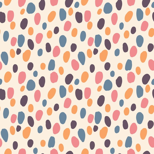 seamless pattern of multicolored abstract spots on a beige background