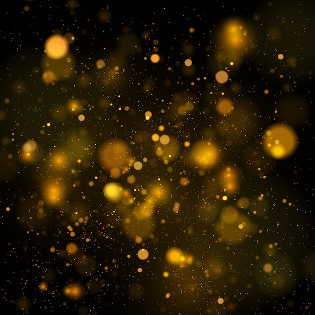 sparkling magical dust particles. abstract background with bokeh effect.
