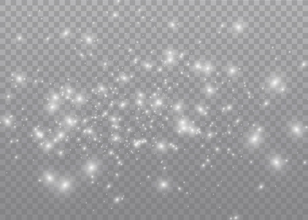 The dust sparks and golden stars shine with special light.  sparkles on a transparent background. . Sparkling magical dust particles.