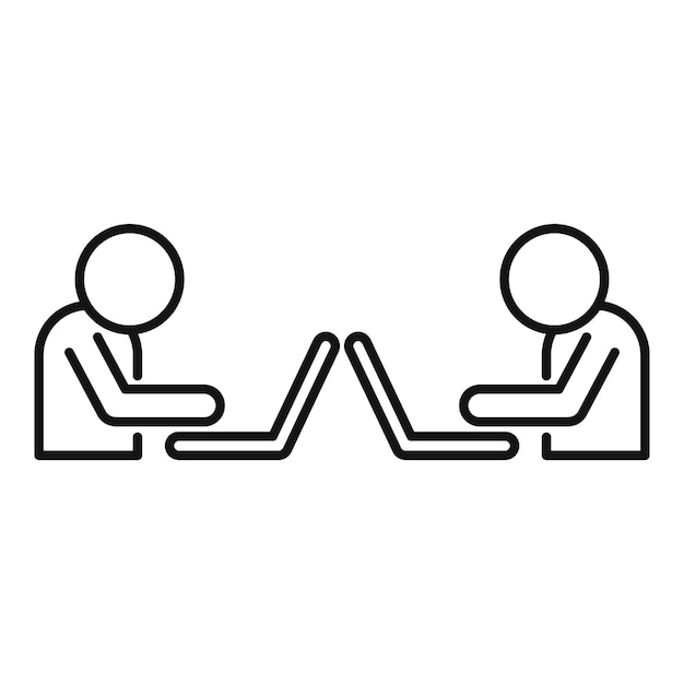 Two businessmen working on laptops facing each other