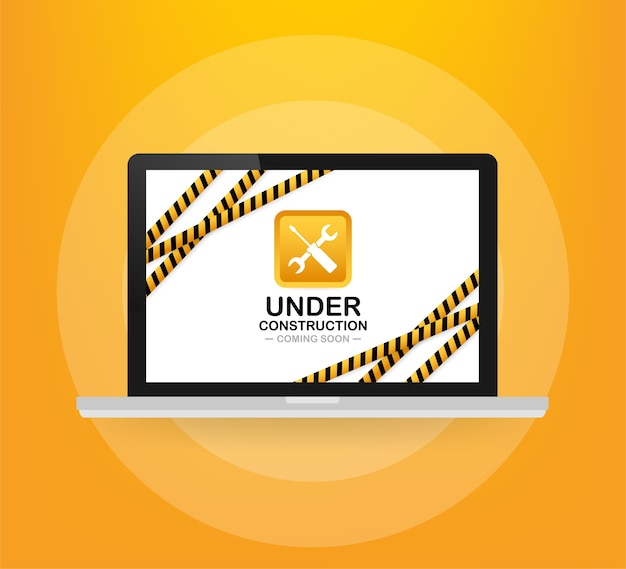 Website Under construction sign on laptop