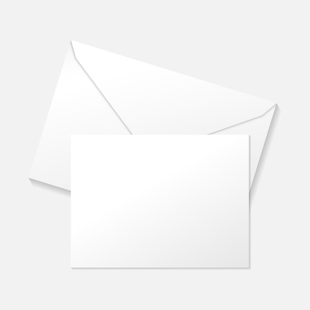 White greeting card on envelope flat lay top view