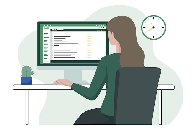 Woman working on a computer at her desk