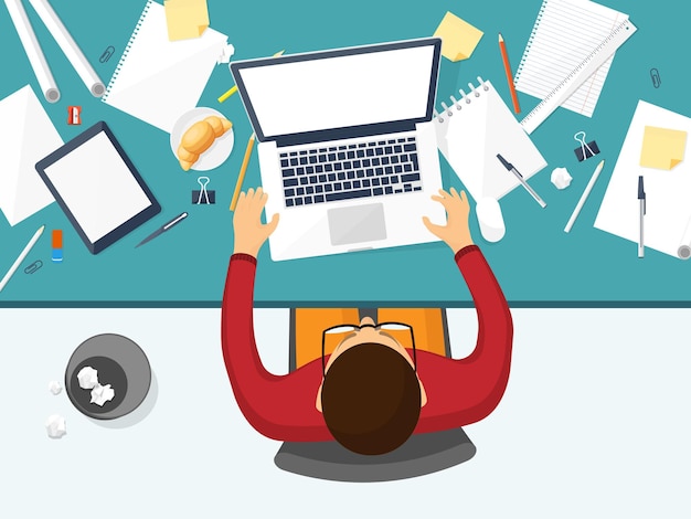 workplace with table and computer laptop documents papers notepad pencil paperwork office work job