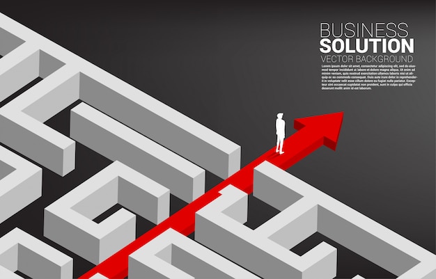 Businessman standing on red arrow route break out of maze. Business concept for problem solving and solution strategy.