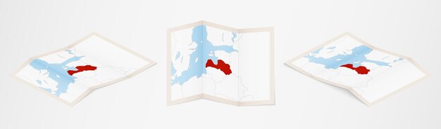 Folded map of Latvia in three different versions.
