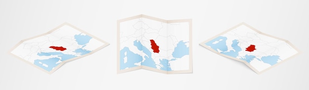 Folded map of Serbia in three different versions.