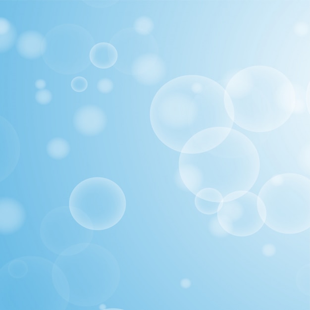 light blue abstract background with a bokeh in the form of circles. 