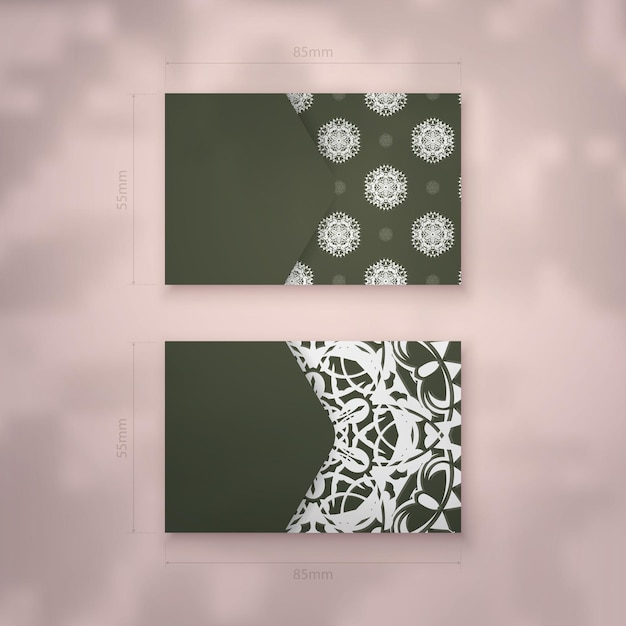 presentable business card in dark green color with luxurious white ornaments for your business.