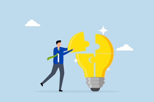 problem solver clever entrepreneur completing lightbulb concept puzzle by placing final jigsaw piec