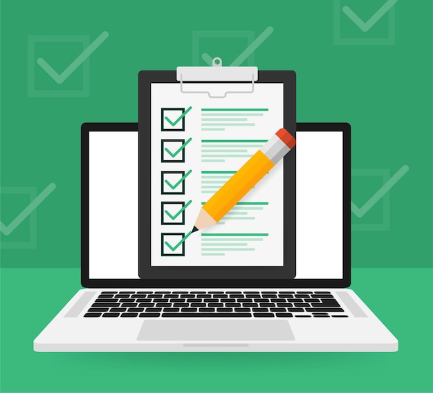 check list laptop on green