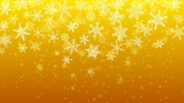 Christmas background of complex blurred and clear falling snowflakes in yellow colors with bokeh effect