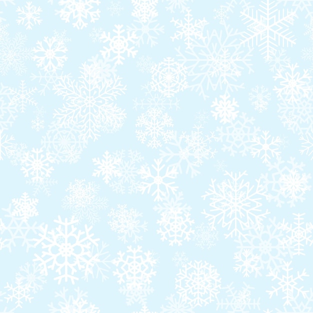 Christmas seamless pattern from white snowflakes on light blue background