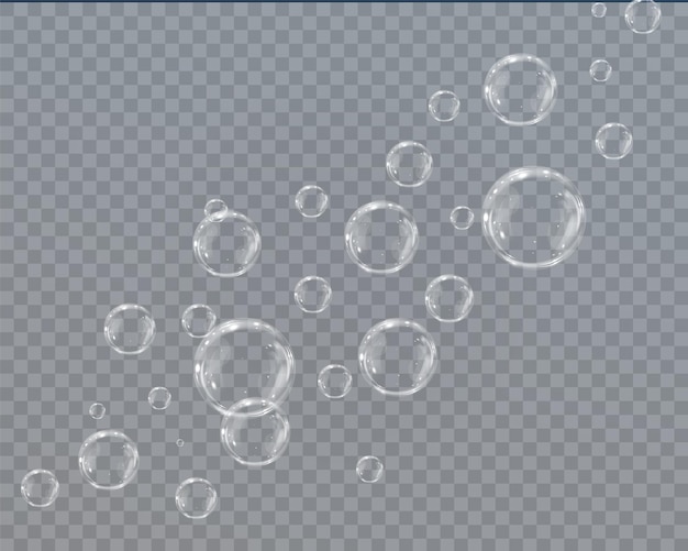Collection of realistic soap bubbles. Bubbles are located on a transparent background.