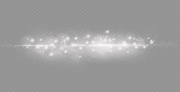 Dust sparks and stars shine with a special light. Christmas light effect.