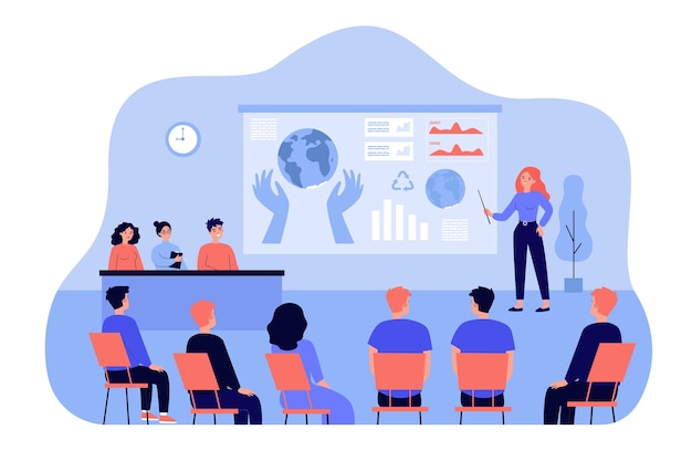 Female speaker standing in front of presentation