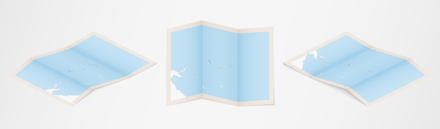 Folded map of Kiribati in three different versions.