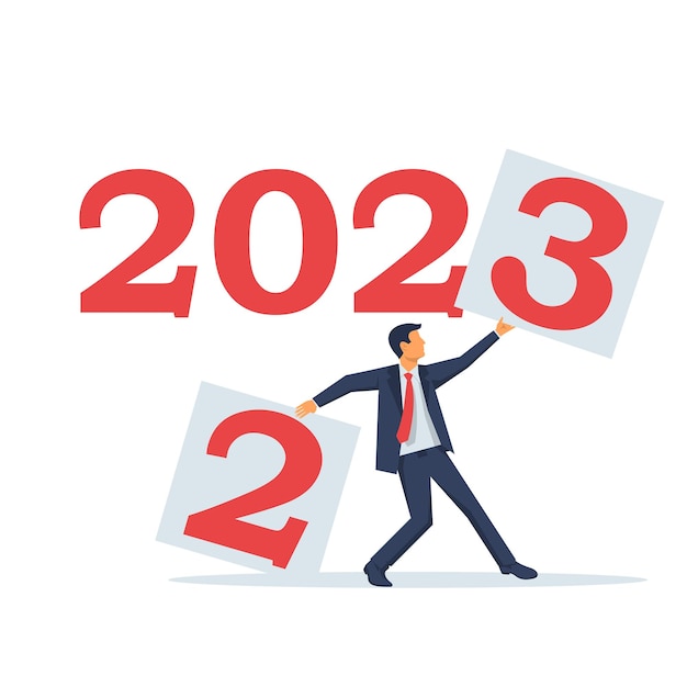 goodbye 2022 change year businessman tears off a sheet with 2 and sets the new year 2023