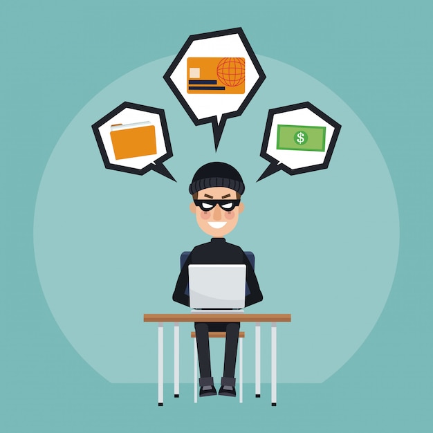 Hacker with laptop and credit card 