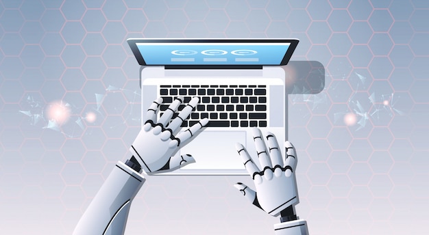 Robottikädet käyttävät kannettavaa tietokonetta kirjoittamiseen