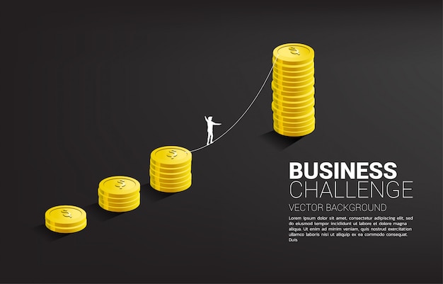 Silhouette of businessman walking on rope walk way to golden coin stack graph .Concept for business risk and challenge.