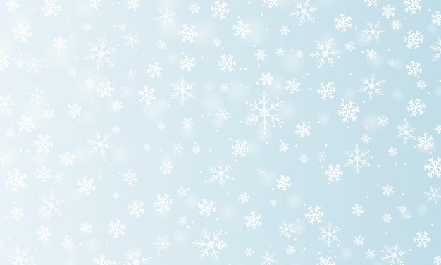 Snow background Winter snowfall White snowflakes on blue sky Christmas background Falling snow