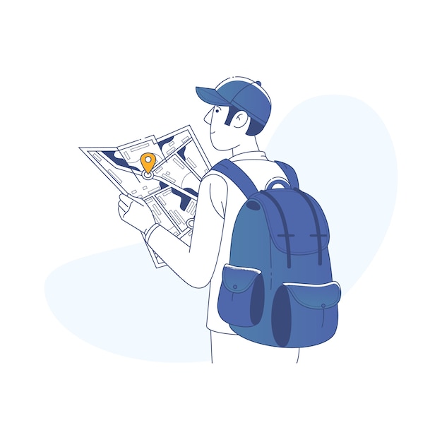 Tourist boy with a backpack in a big city is watching a map
