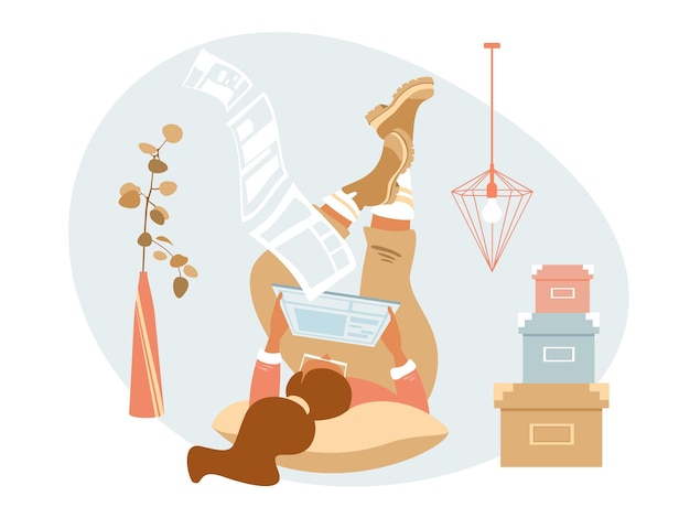 Young woman lies with graphics tablet and reading the news