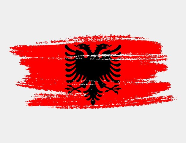 Artystyczny grunge szczotka Flaga Albanii na białym tle