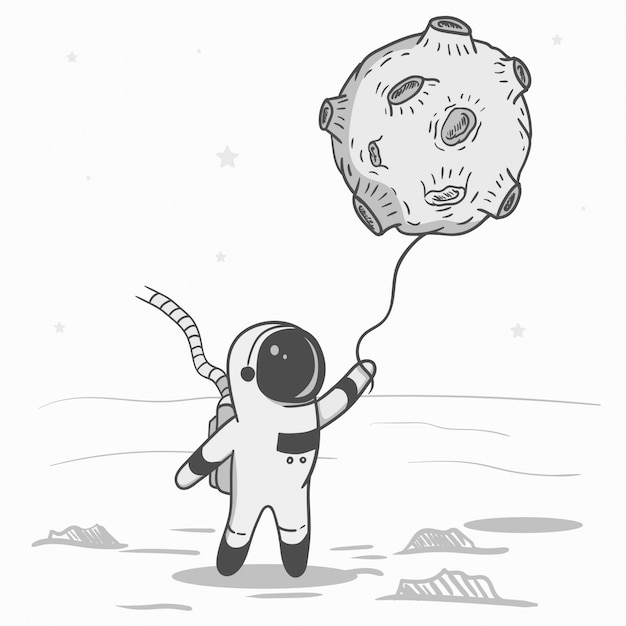 Astronauta trzyma balon w kształcie księżyca