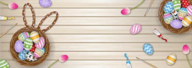 Baner Wielkanocny z jajkami w gnieździe i kwiatami