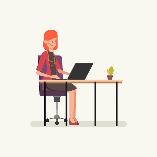 Biznesowa kobieta pracuje na laptopie.