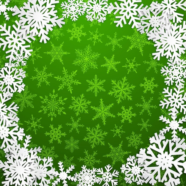 Plik wektorowy bożenarodzeniowa ilustracja z okrągłą ramą białych płatków śniegu na zielonym tle