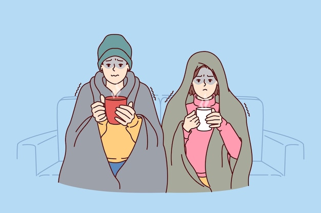 Chory Mężczyzna I Kobieta Siedzą Na Kanapie Owinięci W Koce I Piją Gorącą Herbatę