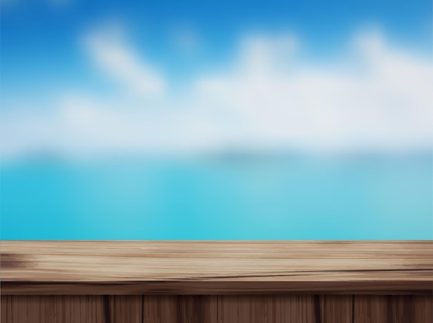 drewniany blat i niewyraźna plaża.
