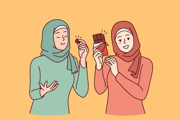 Plik wektorowy dwie arabskie kobiety jedzą czekoladę i cieszą się pędem hormonu szczęścia ubrane w islamskie ubrania