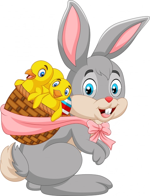 Easter Bunny niosąc kosz piskląt dziecka