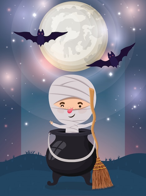 Halloweenowa scena z chłopiec kostiumu mamusią