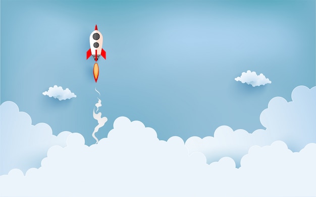 ilustracja rakiety latające nad chmurą. projekt papieru sztuki