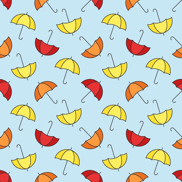 Plik wektorowy jasnożółto-pomarańczowe i czerwone parasole na niebieskim tle