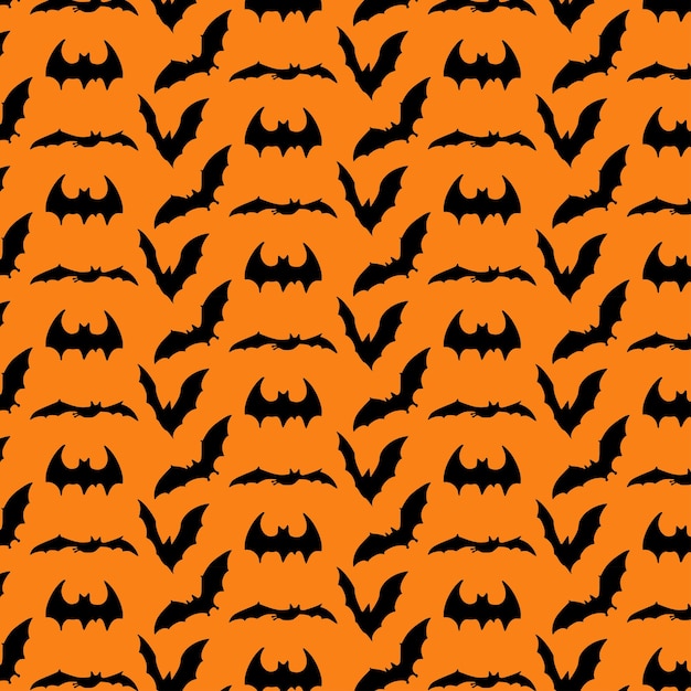 jasny wzór z czarnymi nietoperzami na pomarańczowym tled halloween uroczyste ozdoby jesienne październik druk świąteczny projekt tekstylny